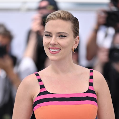 Scarlett Johansson poses during a photocall for the film Asteroid City at the 76th Cannes Film Festi...