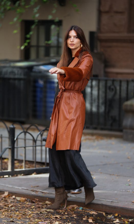 Emily Ratajkowski is seen standing outside her apartment on October 9, 2023 in New York, New York.