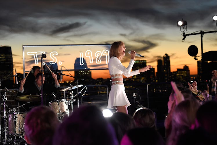 Taylor Swift performs during her '1989' Secret Session in 2014, before the '1989' beach versus city ...