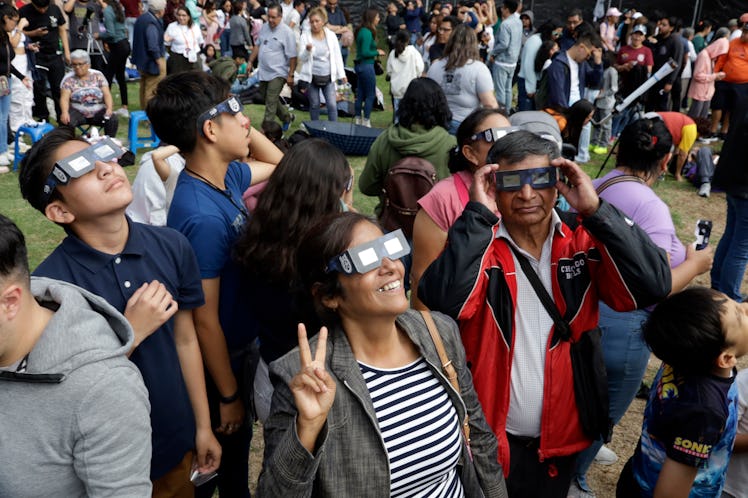 October14, 2023, Mexico City, Mexico: People observe the annular solar eclipse at the Luis Enrique E...