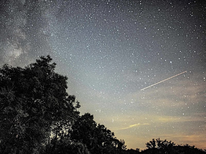 This photograph taken on August 14, 2023 in Fontainebleau, southern Paris, shows a view of the sky w...