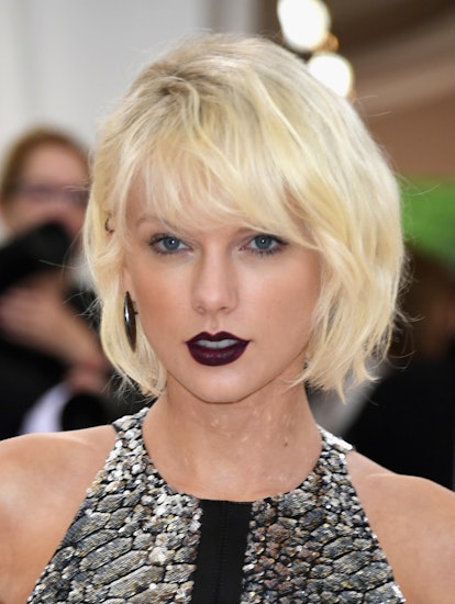 Taylor Swift's wolf haircut with bangs was platinum blonde at the 2016 Met Gala.