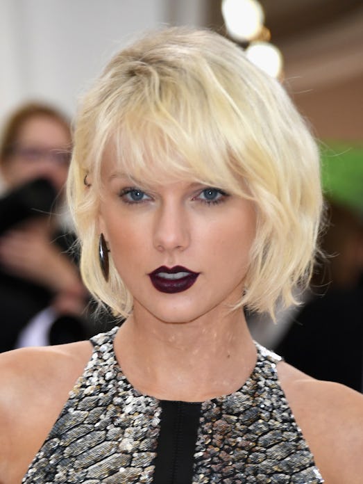 Taylor Swift's wolf haircut with bangs was platinum blonde at the 2016 Met Gala.