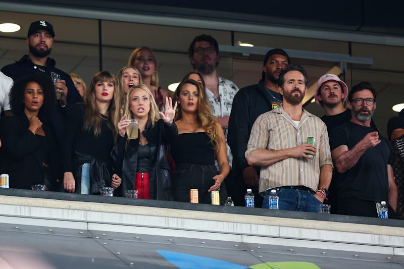 Taylor Swift, Brittany Mahomes, Blake Lively, Ryan Reynolds, and Hugh Jackman watch from the stands ...