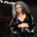 US actress Andie MacDowell presents a creation for L'Oreal Paris during a show as part of the Paris ...