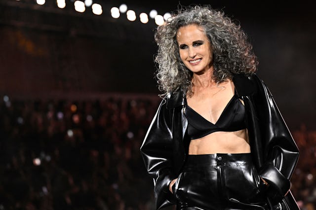 US actress Andie MacDowell presents a creation for L'Oreal Paris during a show as part of the Paris ...