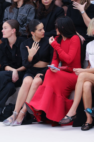 Rosalia and Kylie Jenner attend the Acne Studios Womenswear Spring/Summer 2024 show as part of Paris...