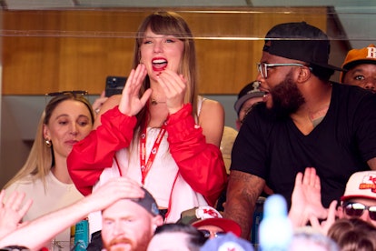 Taylor Swift cheers from a suite as the Kansas City Chiefs play the Chicago Bears at GEHA Field at A...