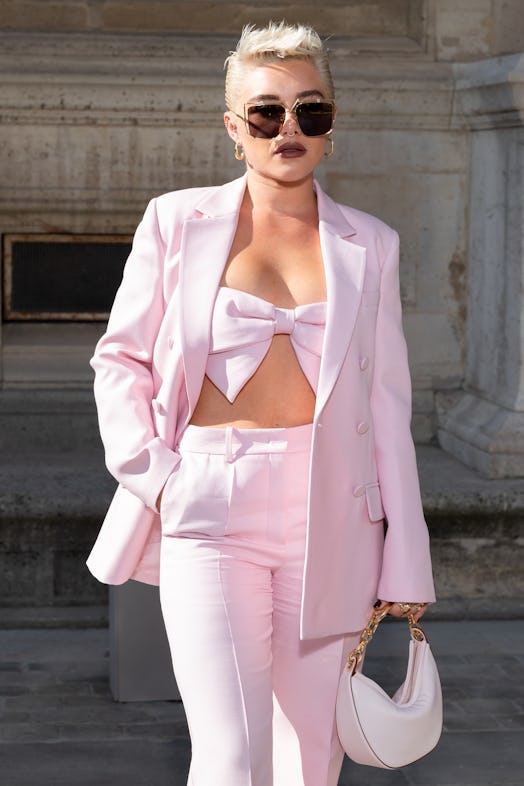 Florence Pugh spiky hair and dark pink lipstick Paris Fashion Week ss24