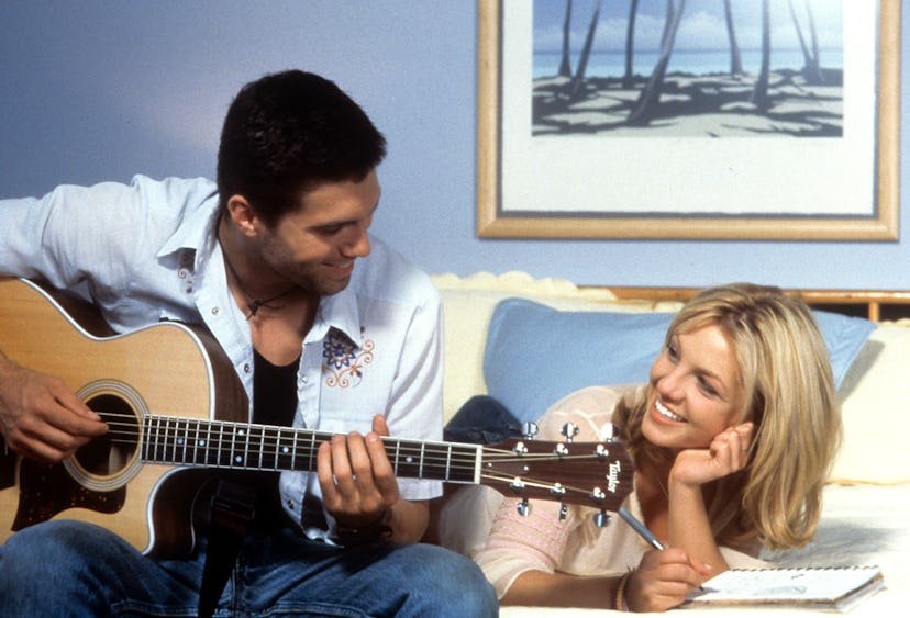 Anson Mount playing guitar for Britney Spears in a scene from the film 'Crossroads', 2002. (Photo by...