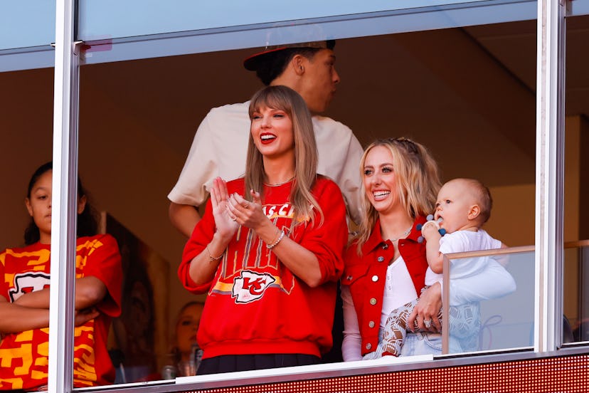Taylor Swift wearing a friendship bracelet at Travis Kelce’s football game.