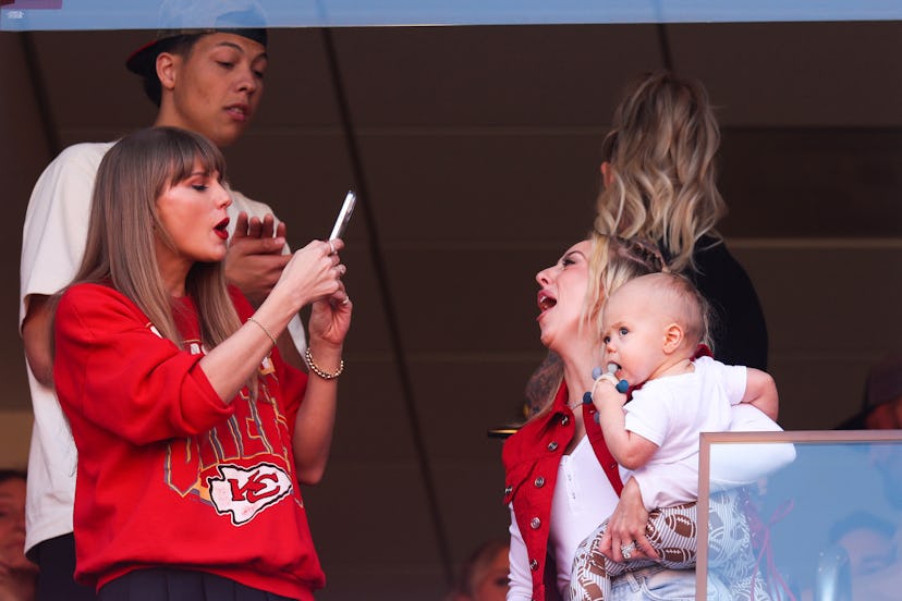 Taylor Swift and Brittany Mahomes cheering at Travis Kelce’s game.
