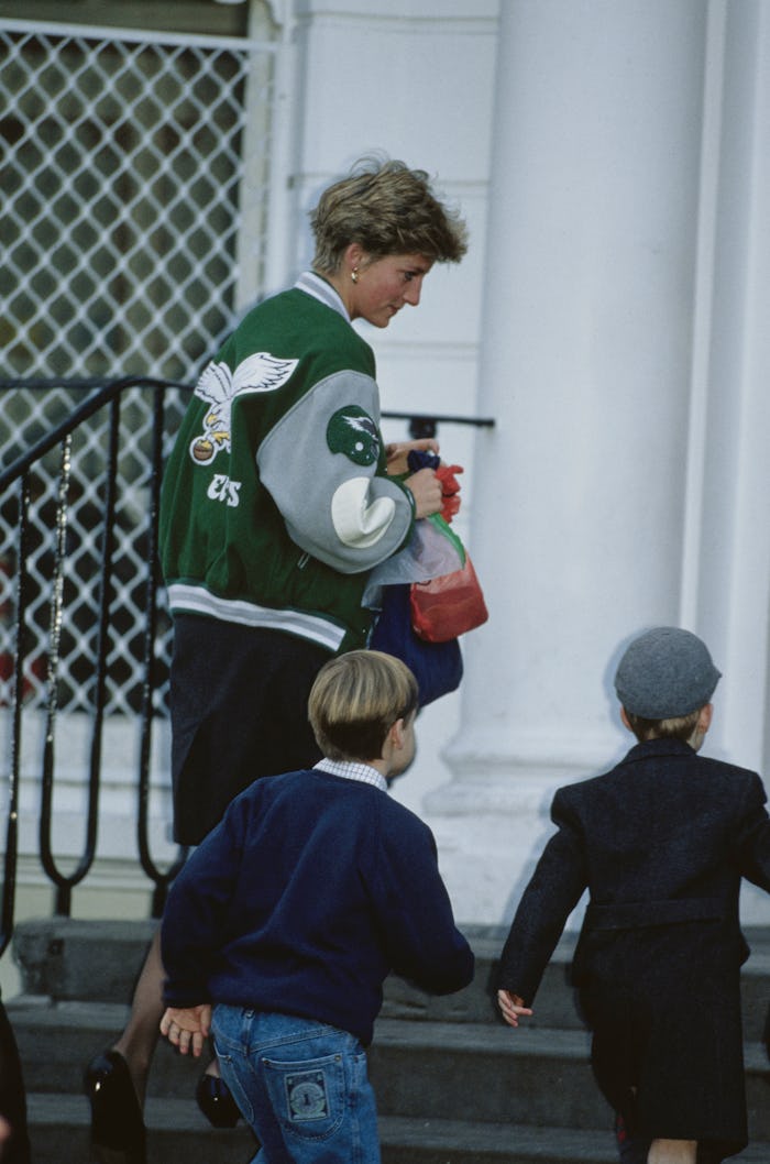 Diana, Princess of Wales (1961 - 1997) wearing a Philadelphia Eagles jacket to drop off her son Pri...