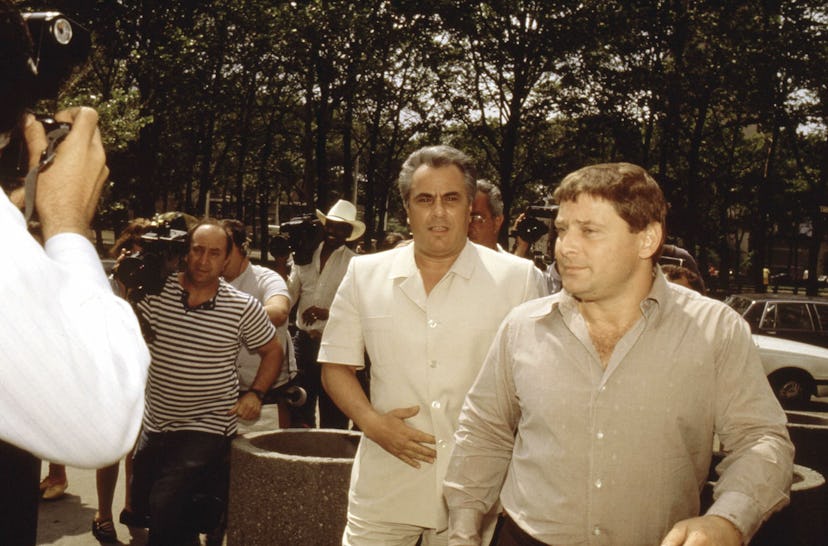 365090 01: John Gotti, center, enters the Brooklyn Federal courthouse with Sammy "The Bull" Gravano ...