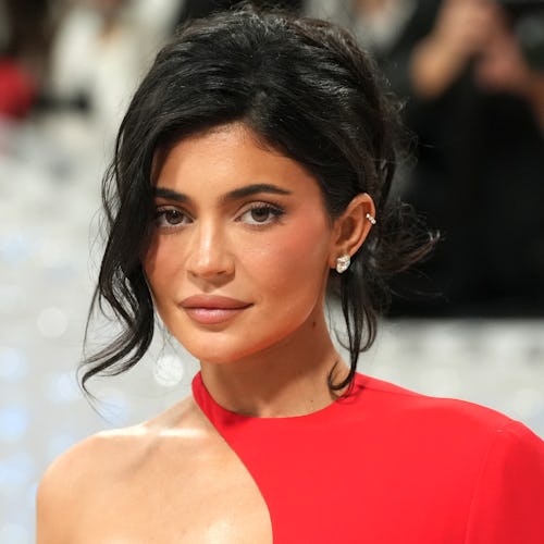 Kylie Jenner attends The 2023 Met Gala Celebrating Karl Lagerfeld in a red dress