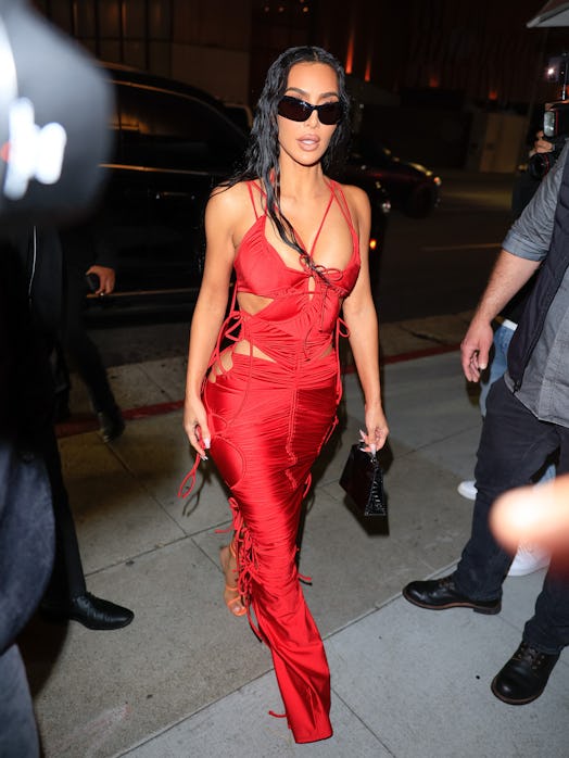 Kim Kardashian wears a red dress to her 43rd birthday party