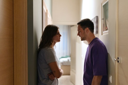 Young man and woman arguing about something