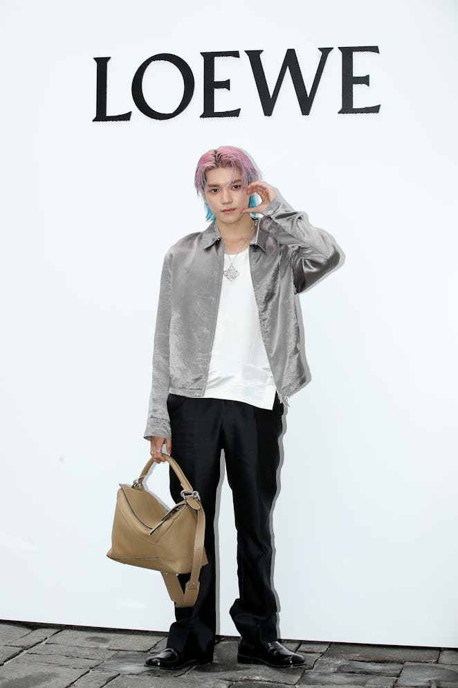 SEOUL, SOUTH KOREA - AUGUST 22: Taeyong of boy band NCT 127 is seen at the 'LOEWE' 2023 F/W collecti...