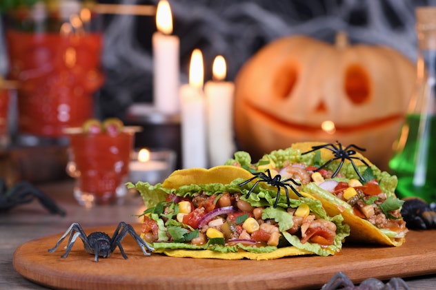 Tacos with plastic spiders on them, a cute Halloween lunch idea for kids