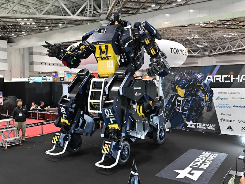 Japanese robotics startup Tsubame Industries exhibit the ARCHAX robot, weighing 3.5 tonnes and measu...