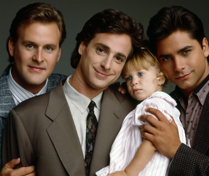 John Stamos had a nice moment with the Olsen twins.