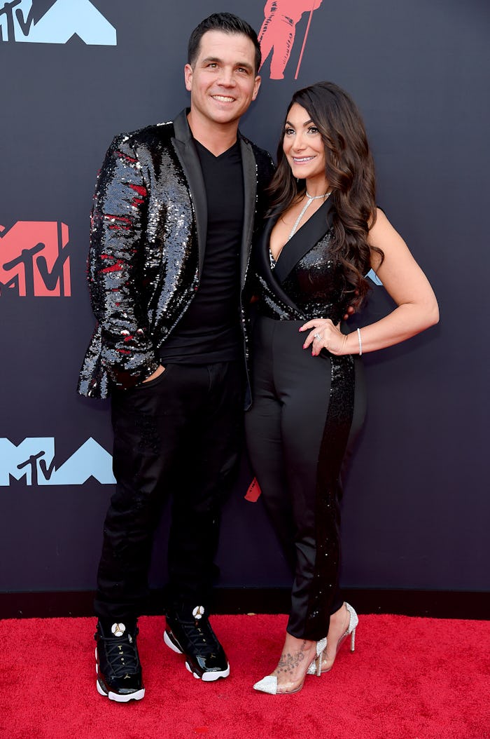 NEWARK, NEW JERSEY - AUGUST 26: Chris Buckner and Deena Nicole Buckner of the Jersey Shore cast atte...