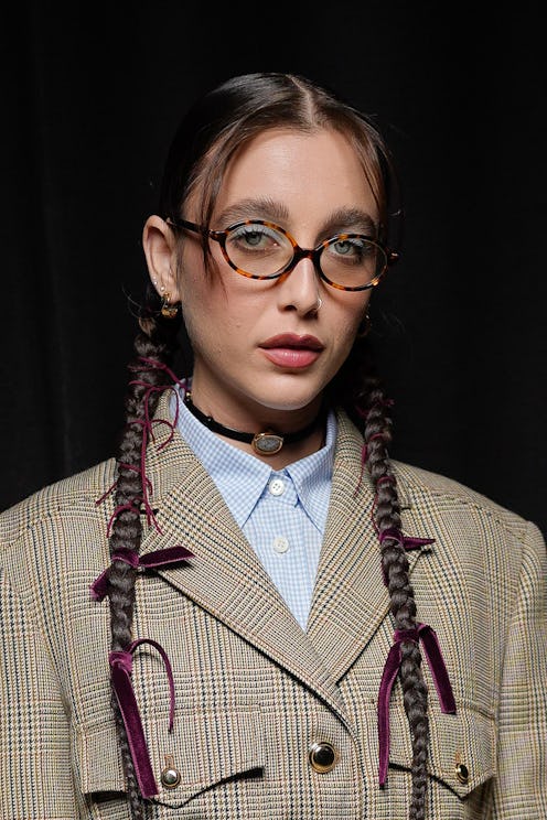 Emma Chamberlain long pigtail braids at Paris Fashion Week ss24