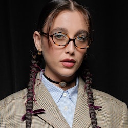 Emma Chamberlain long pigtail braids at Paris Fashion Week ss24