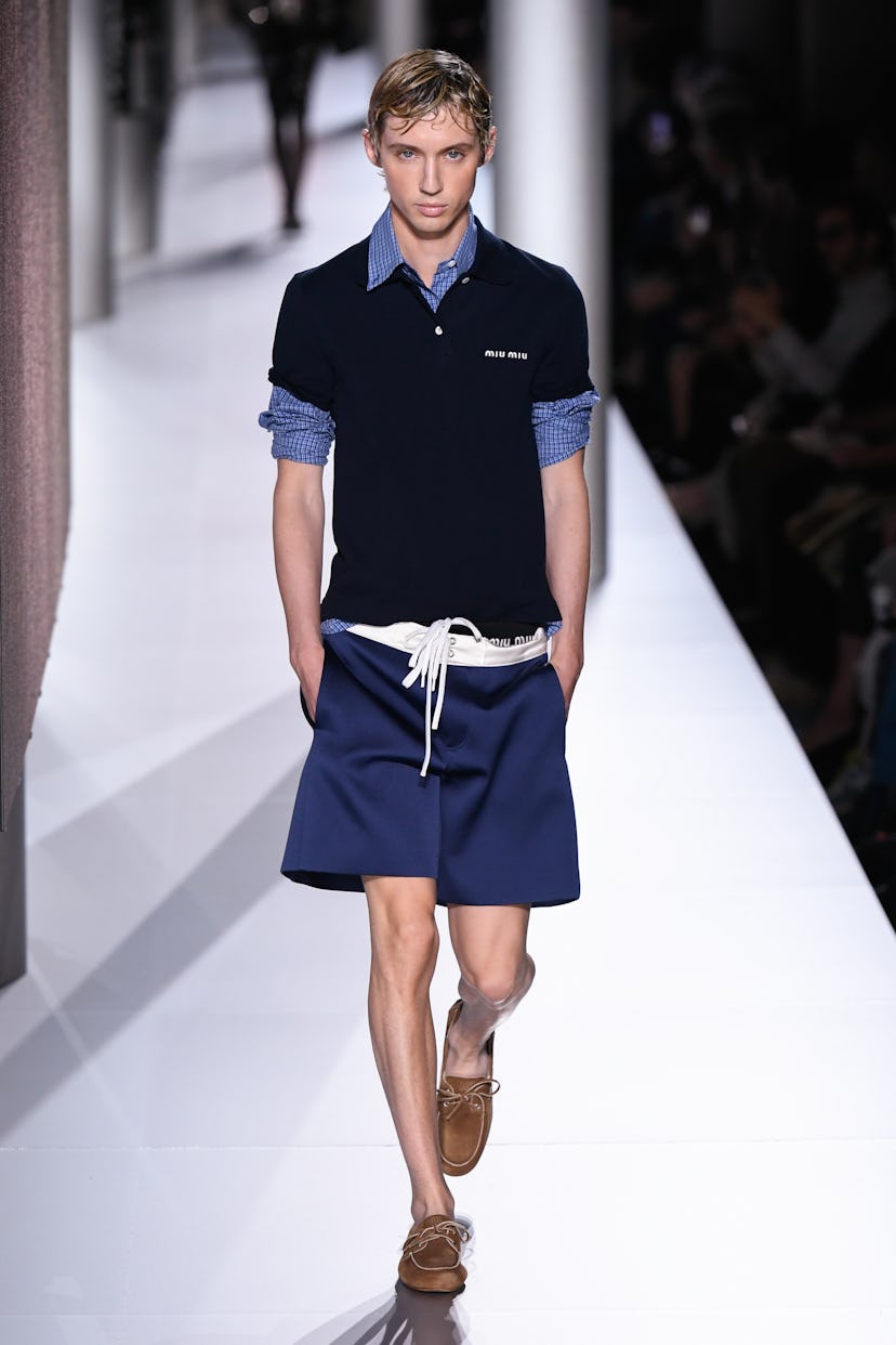 Troye Sivan on the runway at Miu Miu Ready To Wear Spring 2024 held at Palais d'Iéna on October 3, 2...