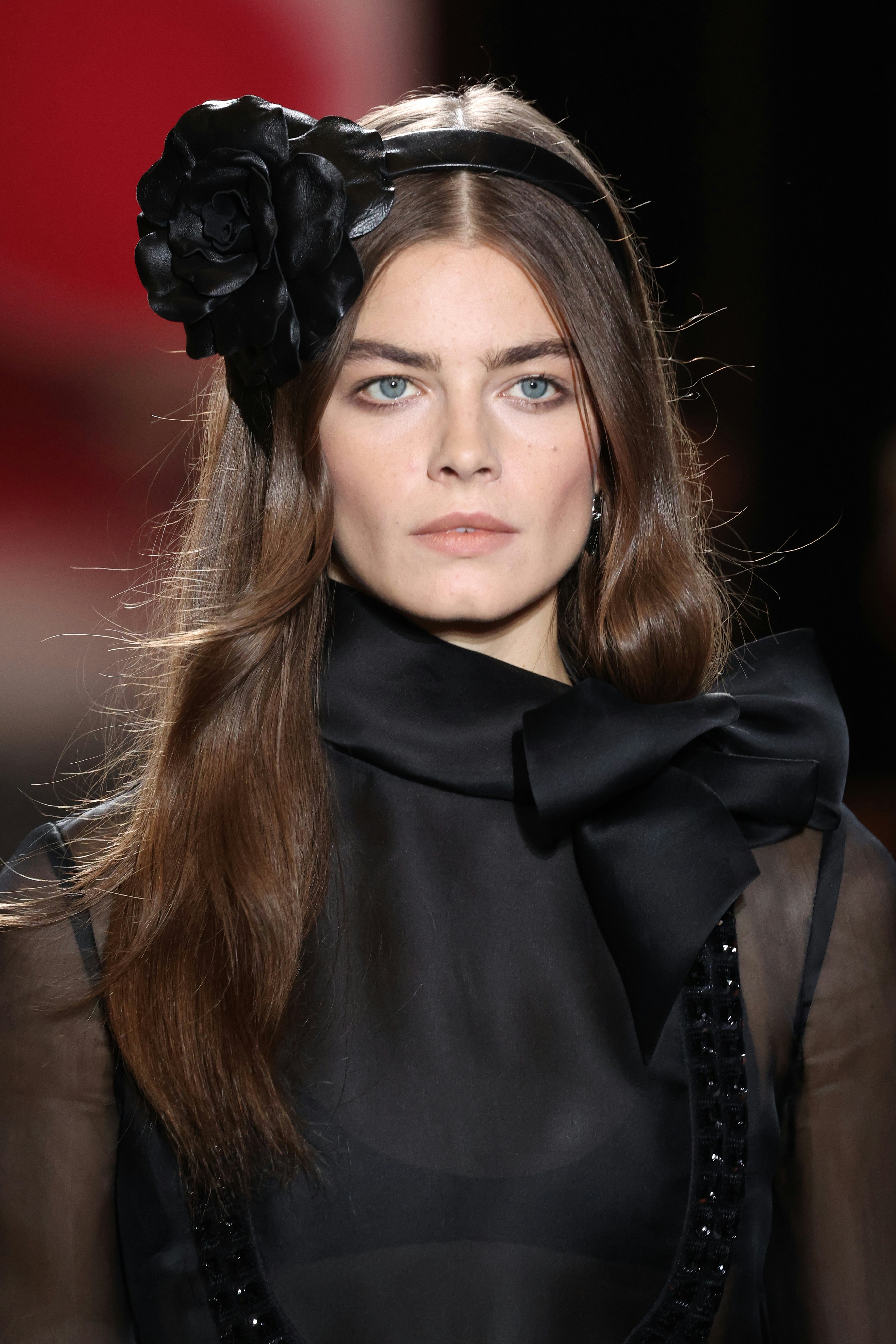 Sleek headbands, glossy waves, dark lips and more beauty trends from the  Spring 2024 Fashion Week runways