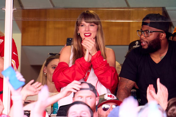 Taylor Swift cheers from a suite as the Kansas City Chiefs play the Chicago Bears at GEHA Field at A...