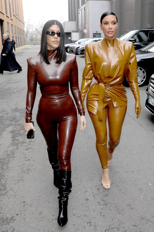 Kourtney and Kim Kardashian attend the Balenciaga show as part of the Paris Fashion Week Womenswear ...