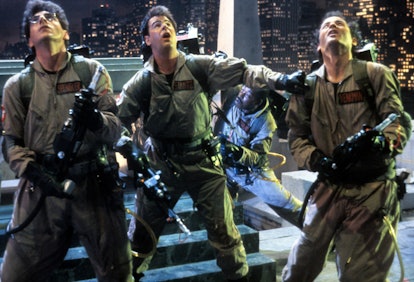 Left to right: Harold Ramis, Dan Aykroyd, Ernie Hudson (background) and Bill Murray in a scene from ...