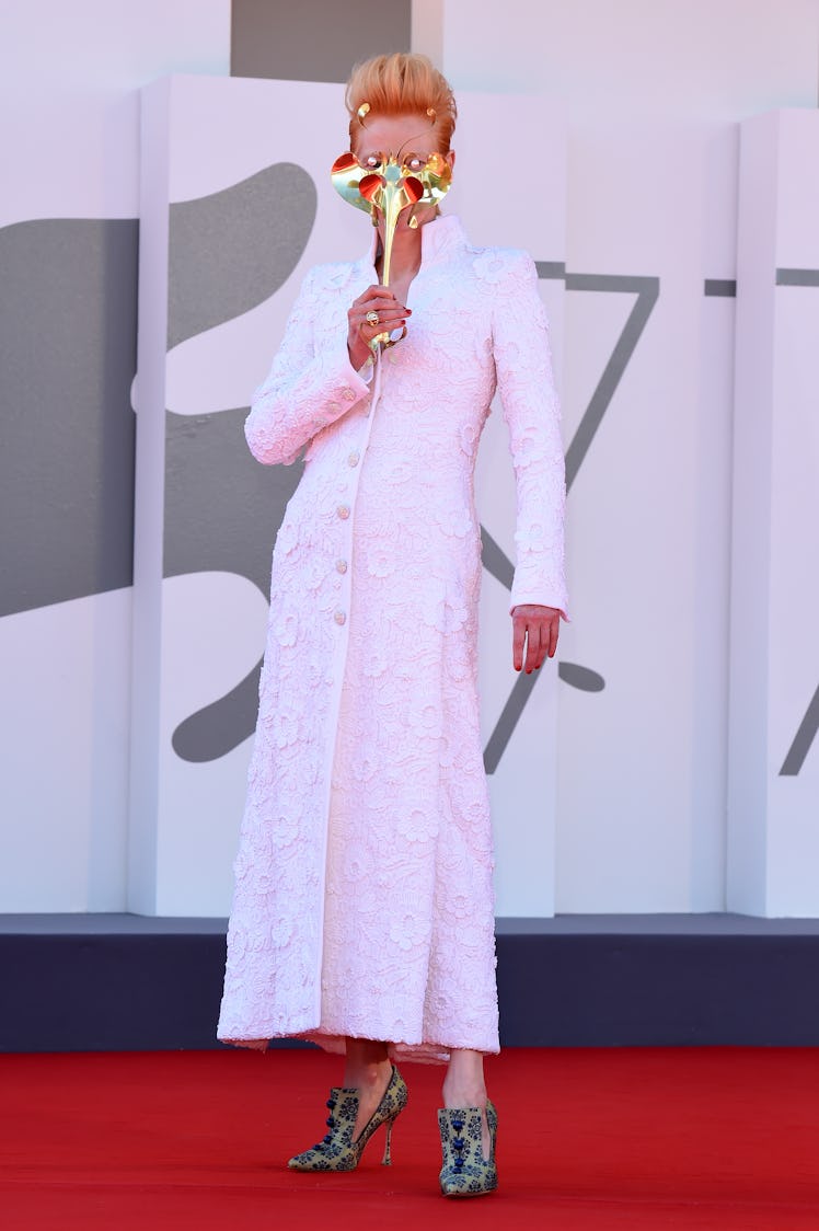 Tilda Swinton walks the red carpet ahead of the movie "The Human Voice" 