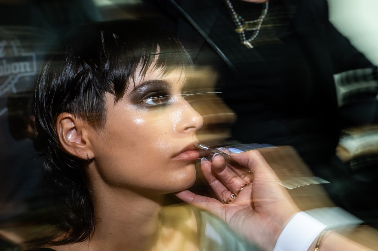 MILAN, ITALY - SEPTEMBER 20: A model prepares in the backstage ahead of the Iceberg fashion show dur...