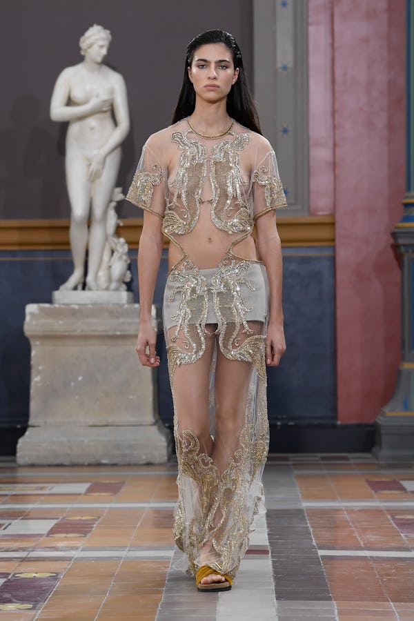 Model on the runway at Valentino Ready To Wear Spring 2024 held at École des Beaux Arts on October 1...