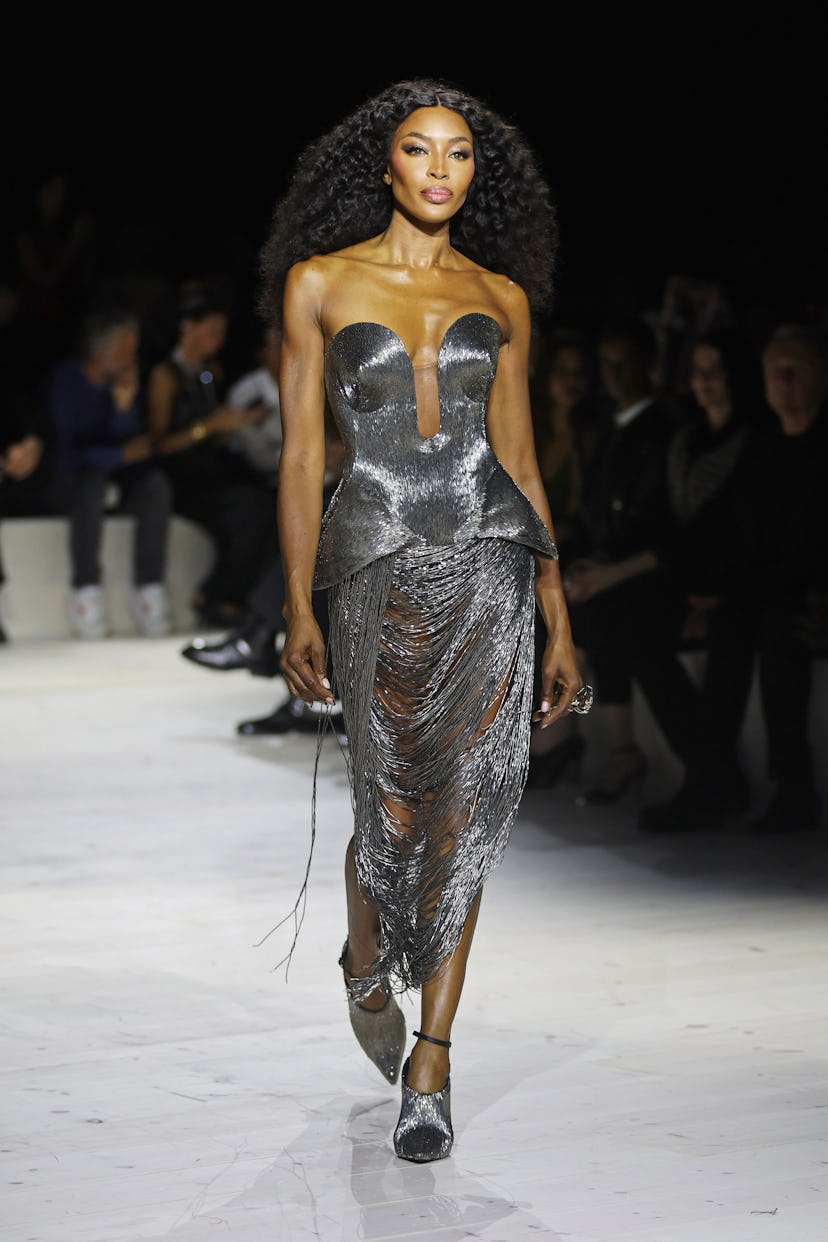 Naomi Campbell walks the runway at the Alexander McQueen SS24 show during Paris Fashion Week at Le C...
