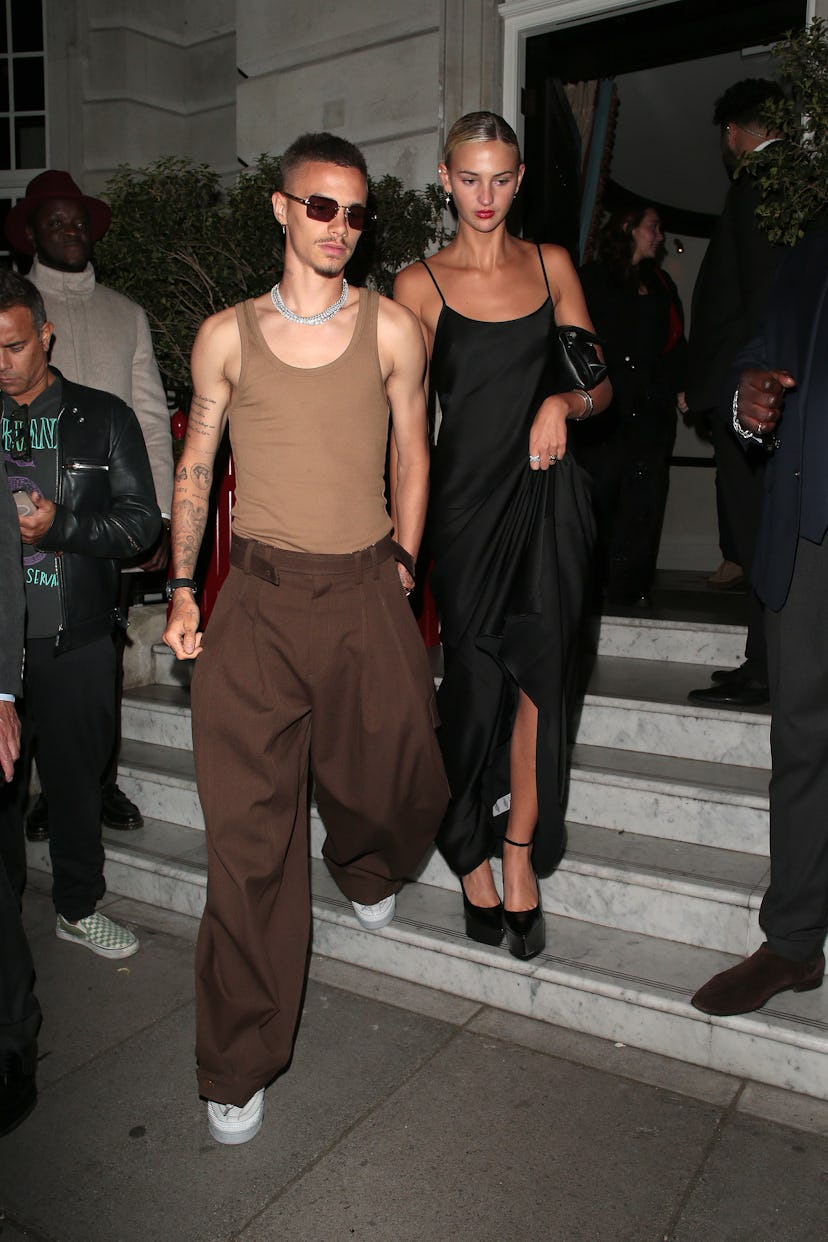 Romeo Beckham and Mia Regan seen attending Beckham - UK TV premiere after party at The Twenty Two on...