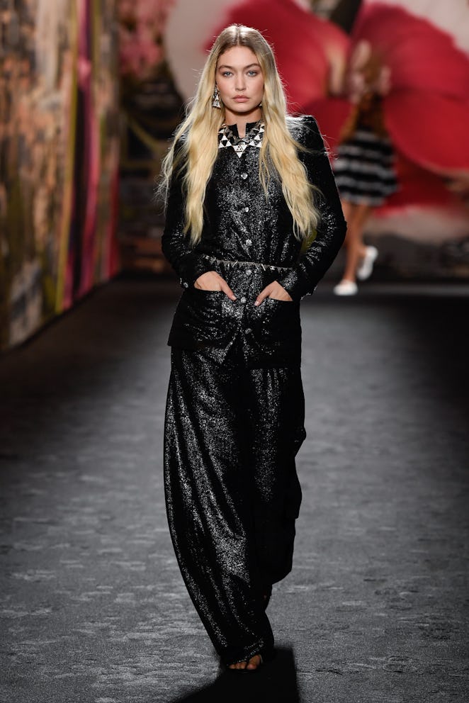 Gigi Hadid walks the runway at Chanel Ready To Wear Spring 2024 held at Grand Palais Ephémère on Oct...