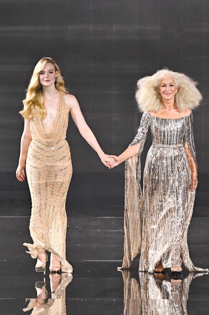 Elle Fanning and Helen Mirren walk the runway during "Le Défilé L'Oréal Paris - Walk Your Worth" Sho...