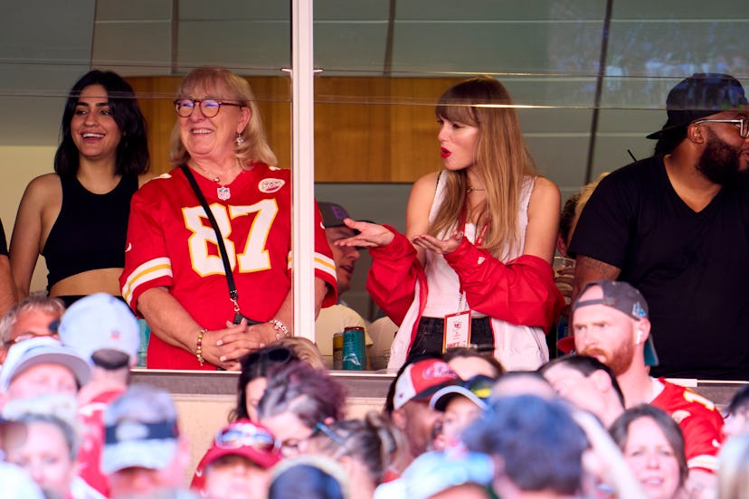 KANSAS CITY, MO - SEPTEMBER 24: Taylor Swift cheers from a suite with Donna Kelce as the Kansas City...