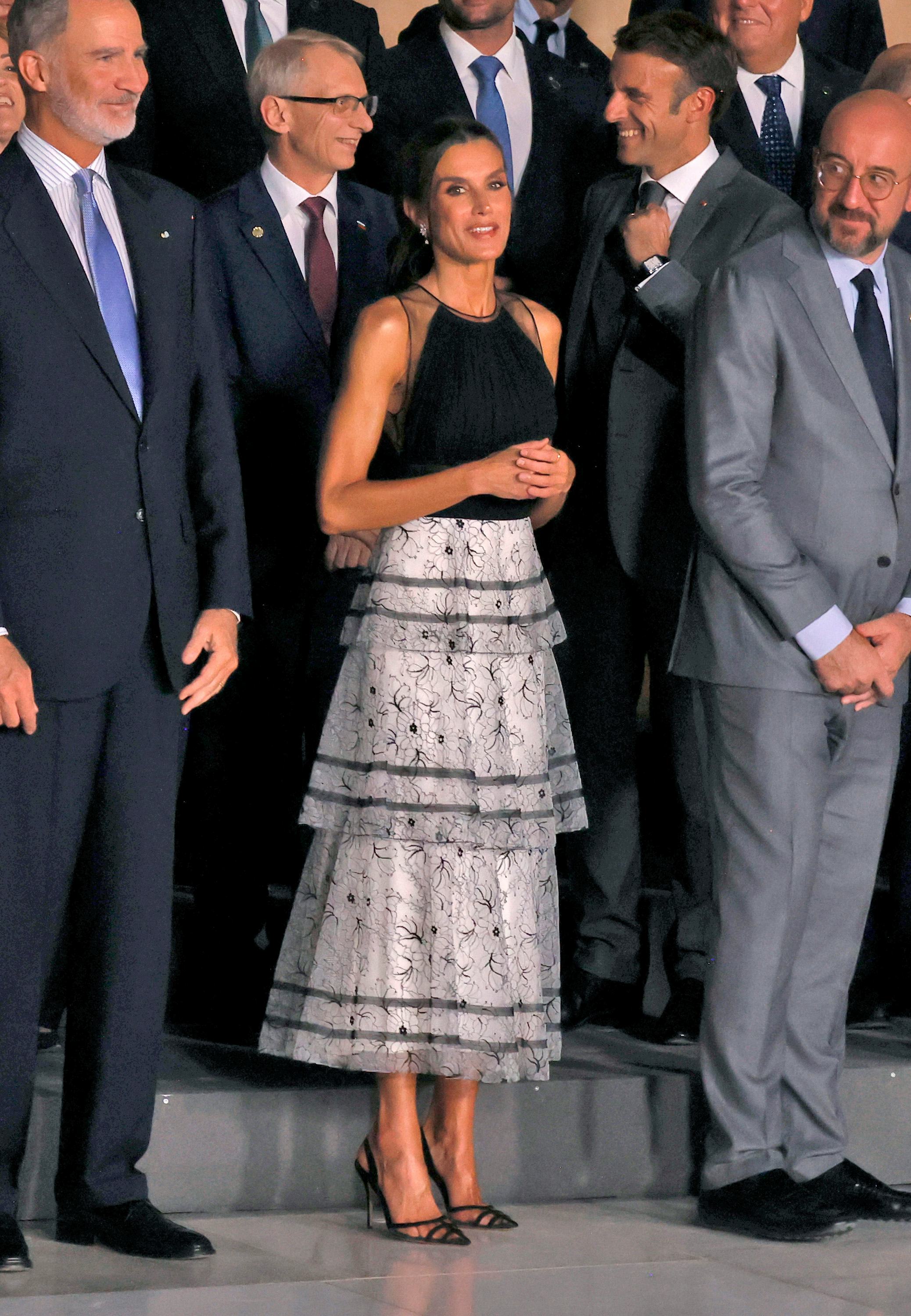 Queen Letizia Pairs "Naked" Heels With a Semi-Sheer Midi Dress