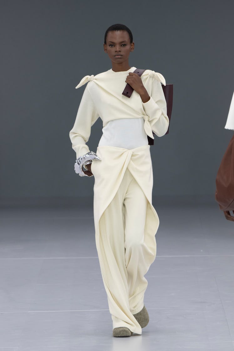 PARIS, FRANCE - SEPTEMBER 29: A model walks the runway during the Loewe Ready to Wear Spring/Summer ...