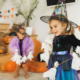 Two children dressed as witches for Halloween. Two sets of data shed light on the most popular Hallo...