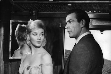 Daniela Bianchi and Sean Connery in a cargo train in a scene from the film 'James Bond: From Russia ...