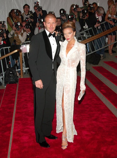 Soccer player David Beckham and singer Victoria Beckham attend the Metropolitan Museum of Art Costum...