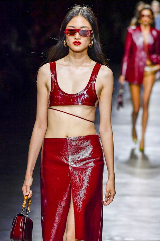 MILAN, ITALY - SEPTEMBER 22: A model walks the runway during the Gucci Ready to Wear Spring/Summer 2...