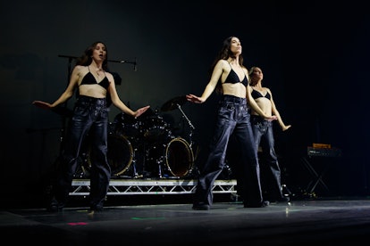 Alana Haim, Danielle Haim and Este Haim of Haim perform at The O2 Arena on July 21, 2022 in London, ...