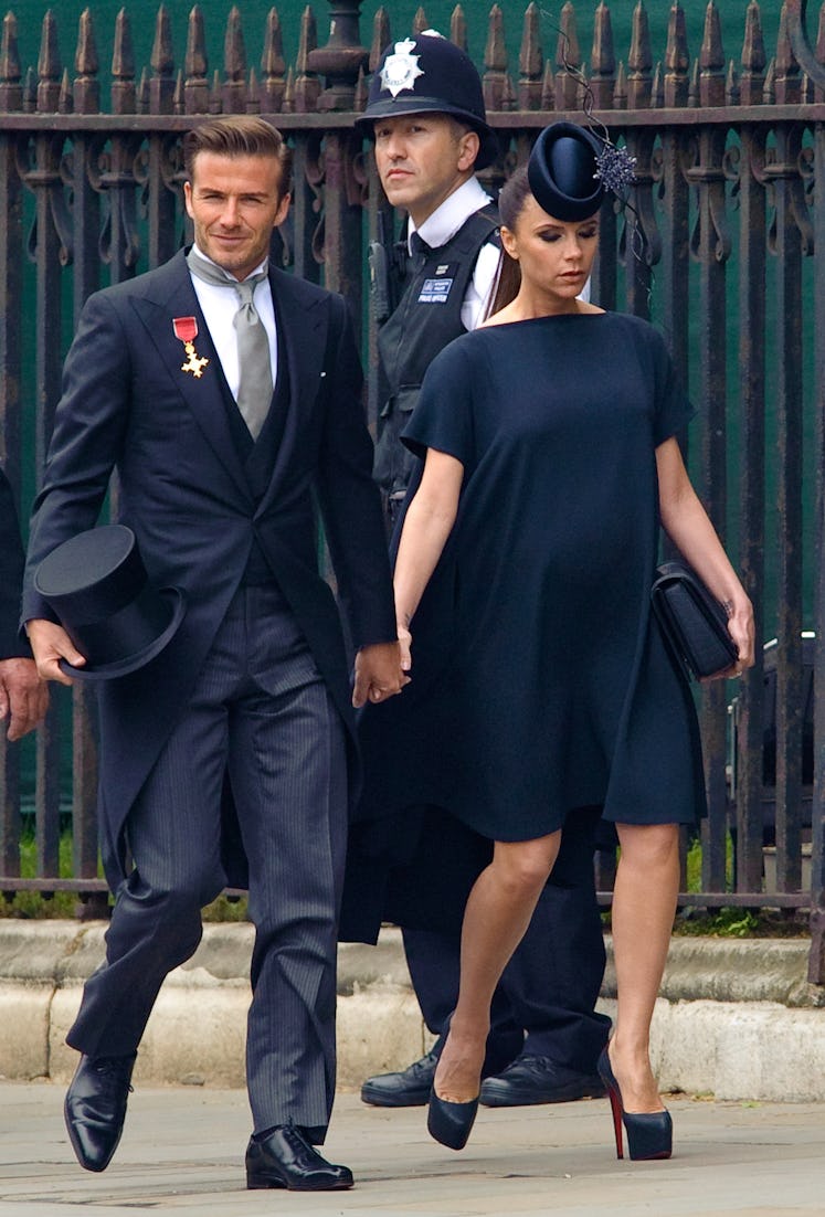 David Beckham and Victoria Beckham arrive at Westminster Abbey on April 29, 2011 in London, England.