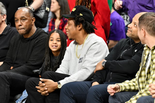 LOS ANGELES, CALIFORNIA - MARCH 08: Jay-Z and Blue Ivy Carter attend a basketball game between the L...